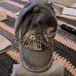 Light blue jeans material hat with gems.